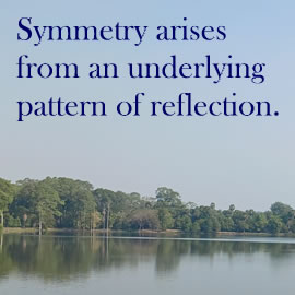 Symmetry arises from an underlying pattern of reflection.